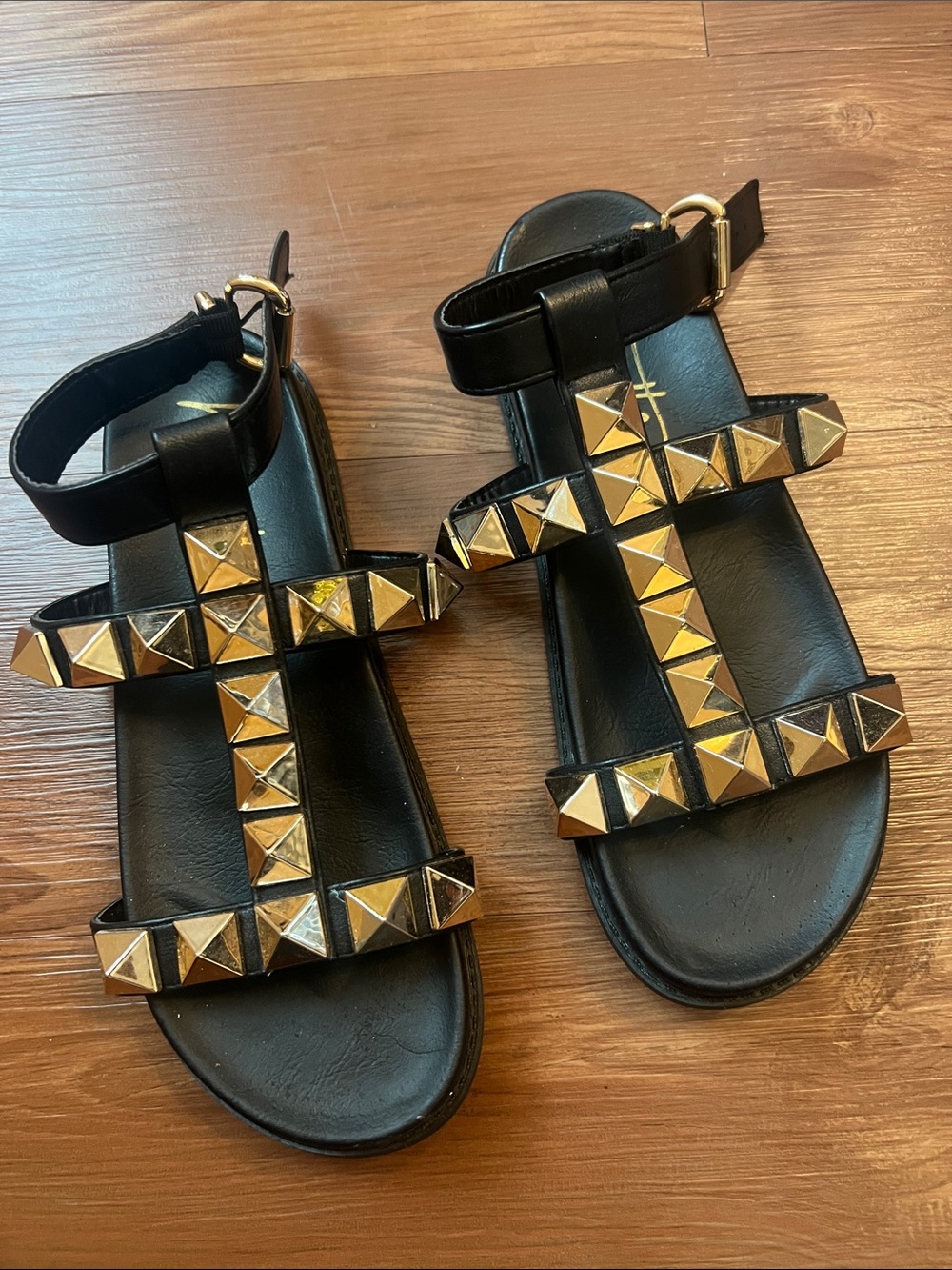 Nanette Lepore Black Leather Studded Gladiator Sandals with Gold Accents
